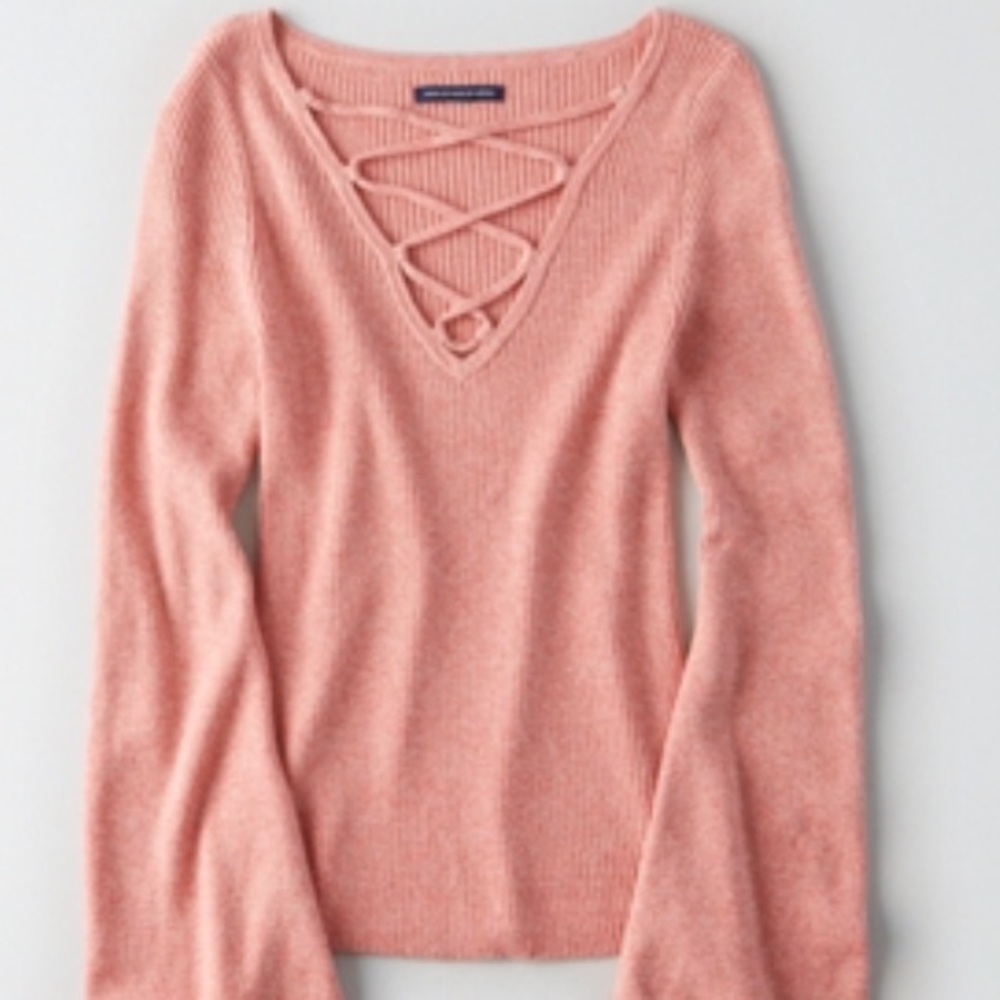 Ribbed bell sleeve sweater in coral